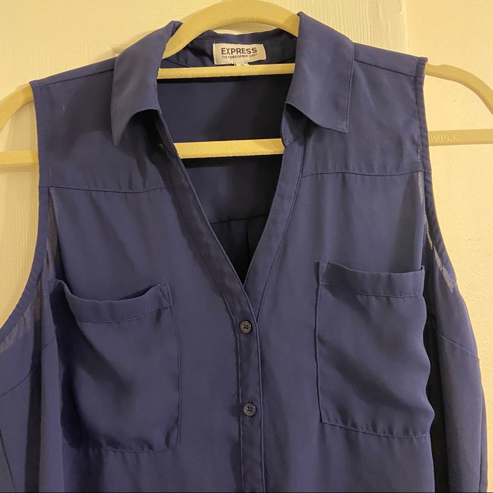 Sleeveless, blue blouse